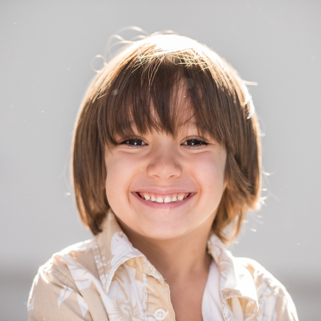 Children’s dentistry in Leicester at Smile Perfections dentist Leicester, featuring a young boy smiling confidently, reflecting positive dental care experiences for kids.