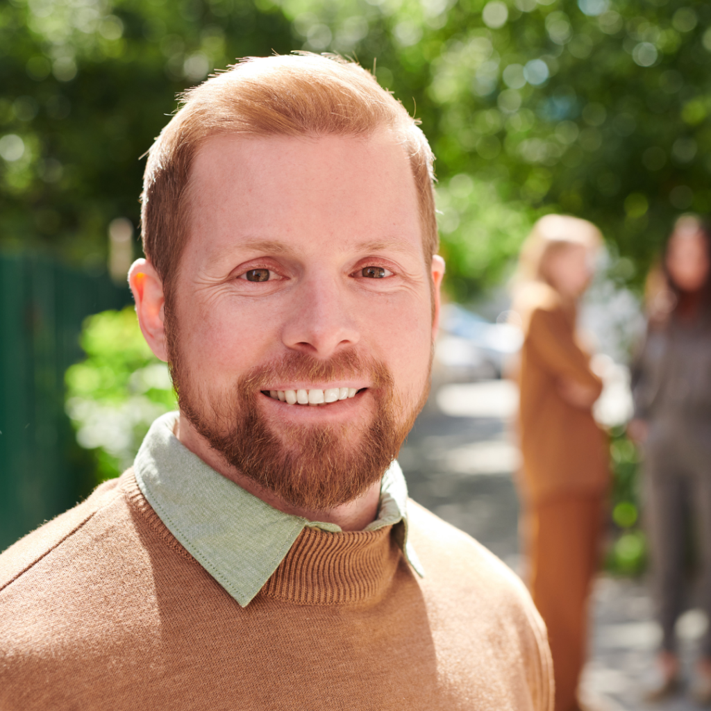 Damon braces in Leicester at Smile Perfections dentist Leicester, showing a man after treatment smiling with straight, well-aligned teeth.