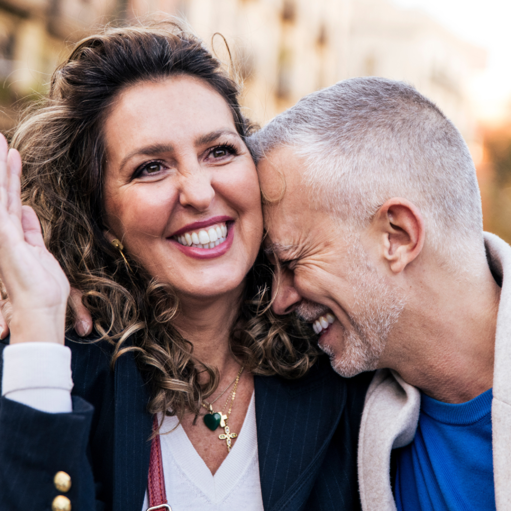 Couple smiling happily, encouraging patients to join Smile Perfections dentist Leicester for friendly and professional dental care.