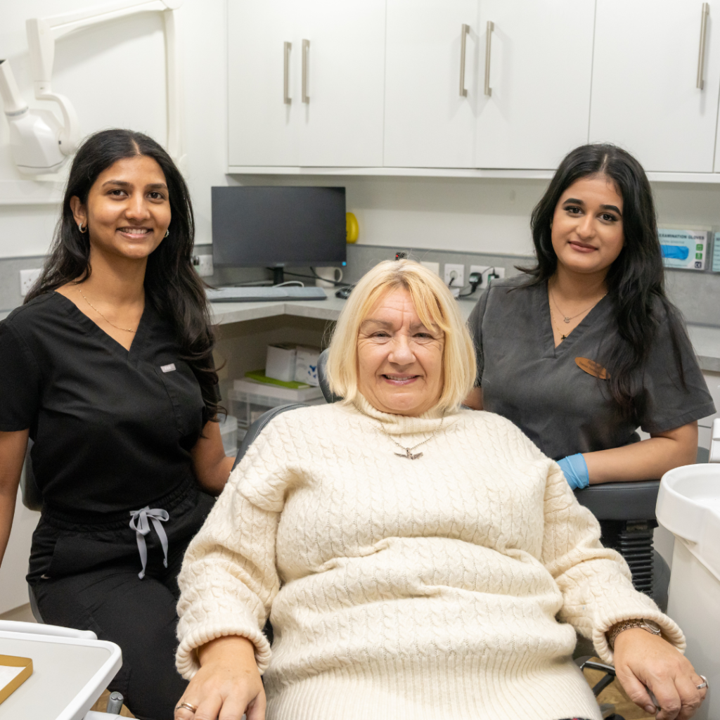 Jeromini, the hygienist, and Rupinder at Smile Perfections dentist Leicester after a hygiene consultation, both smiling and reflecting a successful patient care experience.