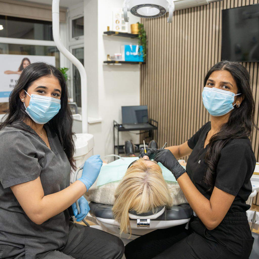 Our hygienist and Rupinder at Smile Perfections dentist Leicester during a hygiene consultation, working together to provide thorough dental care and advice.
