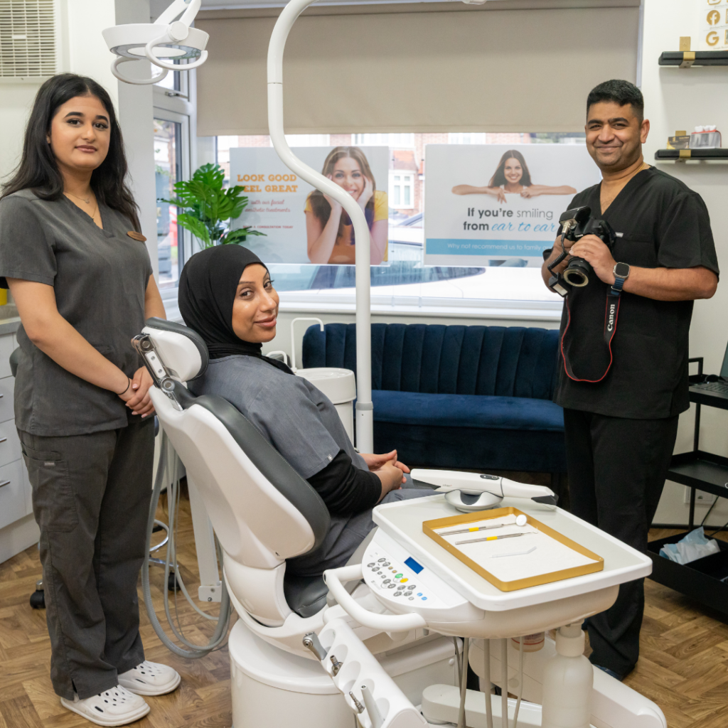 Dr Juttes, Rupinder, and Kaniz in the surgery room at Smile Perfections dentist Leicester, capturing photos during a dental procedure or consultation.
