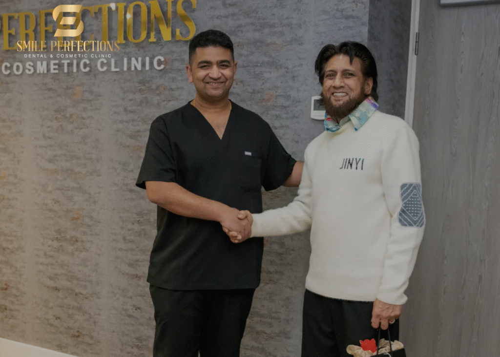 dental crowns procedure - photo with Dr Juttes and a patient, smiling after procedure